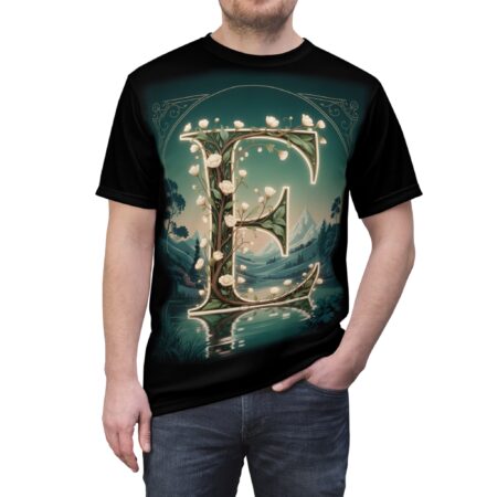Green and white flowers and leaves cover this all over print apparel, depicting a luminous letter E set against a serene mountain landscape and lake.