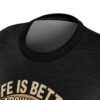 Black vintage graphic t-shirt with 'Life Is Better Around The Campfire' text and retro sunset design.