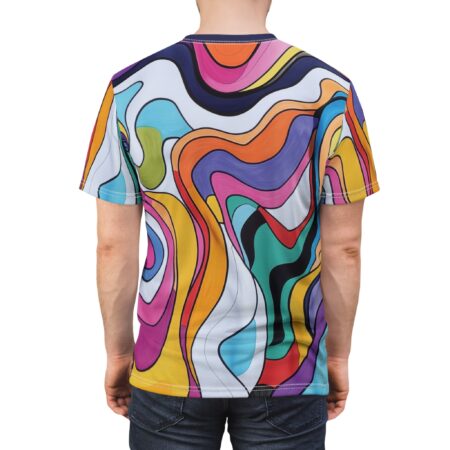 Back view of a man wearing a t-shirt with a vibrant, wavy, psychedelic pattern in shades of pink, orange, yellow, blue, purple, and green.
