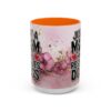 Floral ceramic mug, 'Just a mom who rescues dogs' text with pink flowers and gold accents. Perfect gift for dog moms.