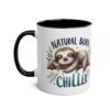 White ceramic mug with a black handle and rim, featuring a sleeping sloth illustration.
