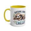 White ceramic mug with yellow handle and interior, featuring a cute sloth sleeping on a branch with the words "NATURAL BORN CHILLER".