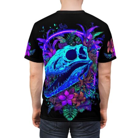 Neon purple and blue floral patterns surround a glowing cyan dinosaur skull on this black t-shirt.