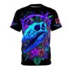 Bright neon purple and blue foliage, flowers, and a dinosaur skull adorn this black t-shirt.