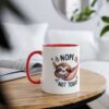 White mug with red rim and handle, featuring a sleepy sloth in a hammock with "NOPE NOT TODAY" text.