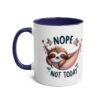 White mug with a dark blue handle and rim, featuring a cute sloth in a hammock with the words "NOPE NOT TODAY".