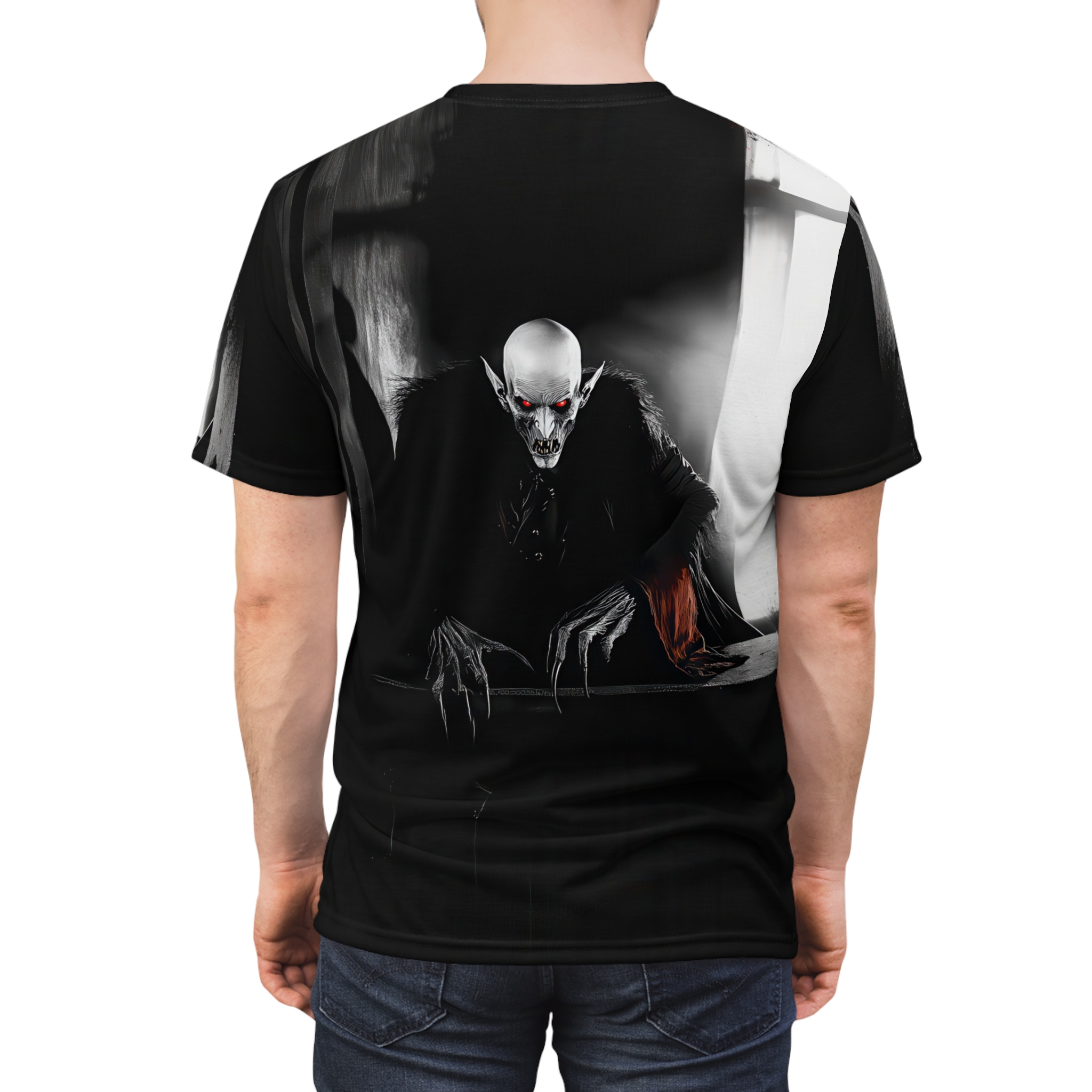 A black and white sublimation graphic tee, depicting a menacing Nosferatu with glowing red eyes and sharp claws reaching forward.