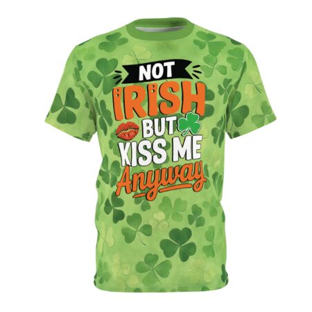 A light green tee with a textured shamrock pattern and the text "NOT IRISH BUT KISS ME ANYWAY" across the chest.