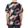 Pink, blue, yellow, and white paint splatters cover this seamless pattern tee, with black as the background.