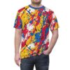 Vibrant yellow t-shirt covered in a dynamic splatter pattern of red, blue, white, and black paint strokes and drips.