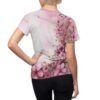 Pink floral sublimation tee with a vintage pattern and gold accents, featuring a wrap around graphic design.