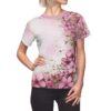 Pink floral watercolor all over print sublimation t-shirt featuring delicate flowers and gold accents. Seamless wrap around graphic.