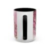 White ceramic mug with black interior featuring a pink floral "Best Mama" sublimation design, perfect for Mother's Day gifts.