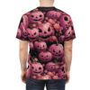 Pink pumpkins with carved faces and pink roses cover this sublimation graphic tee, set against a dark background.