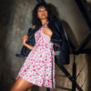 Giraffe print fit and flare dress with pink and white abstract shapes. A stylish short skater dress.