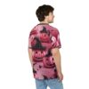 Pink pumpkins with black witch hats and stars cover this all over print apparel, with scattered black leaves.