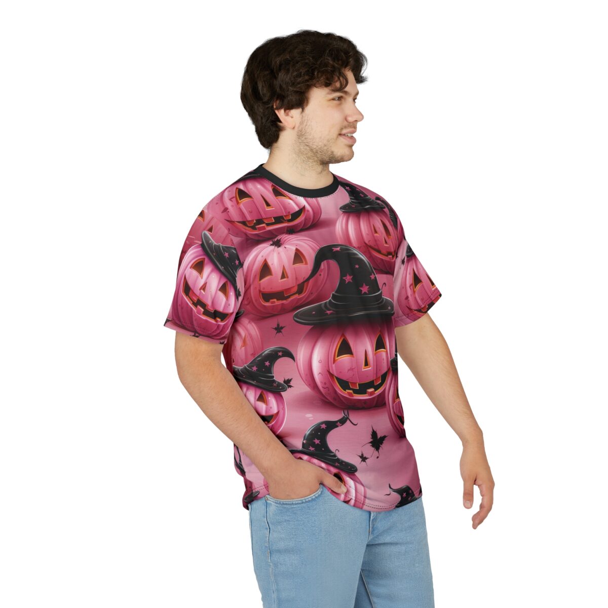 Pink pumpkins with carved faces and black witch hats cover this all over print apparel, with small black bats and stars in the background.