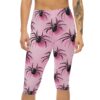 Pink capri leggings featuring a striking black spider pattern and subtle pink leaf accents, ideal for unique activewear.