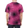 Pink spiderwebs with black spiders and dew drops cover this all over print apparel, the design features radiating web patterns.