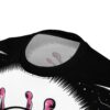 Pink tentacles and a fuzzy black border with white dots cover this seamless pattern tee, depicting a cartoonish alien face.