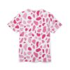 Bright pink and lighter pink abstract organic shapes cover this graphic streetwear tee, with a clean white background.