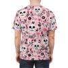 Pink background with white skulls, pink roses, and black floral elements covering this oversized full print tee.