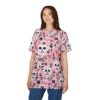 White skulls with black details and pink flowers on a pink background cover this full print shirt.