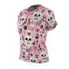 Pink tee with a vibrant seamless print of Day of the Dead skulls and flowers, featuring a 360 wrap-around design for unique graphic apparel.