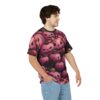 Pink pumpkins with carved faces and rose blooms cover this full print t-shirt, set against a dark background.