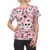 This unique graphic apparel features a pink 360 wrap-around design with playful skulls and vibrant floral elements for edge-to-edge custom fashion.
