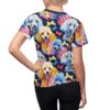 All over print sublimation tee featuring a playful pattern of various colored poodles and dog bones on a navy background.