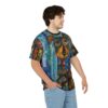 Bright blues, yellows, oranges, and reds with intricate patterns and a dog face design cover this all over print apparel.