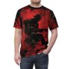 Red and black paint splatters and streaks cover this patterned tee shirt, with a black silhouette of a musician playing guitar.