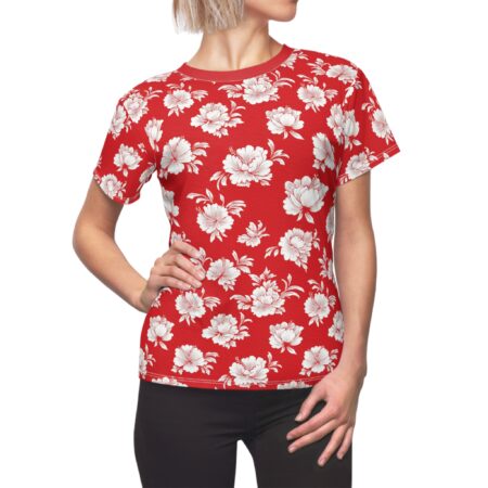 Red sublimation tee with all over print of white hibiscus and peony flowers.