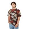 White and cream flowers with red berries and green leaves cover this all over print apparel, on a deep rust background.