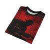 A t-shirt with a distressed red background and a black silhouette of a person playing a guitar.