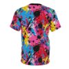 Vivid pink, electric blue, sunshine yellow, and bold red paint splatters cover this patterned tee shirt, with streaks of black and white accents.