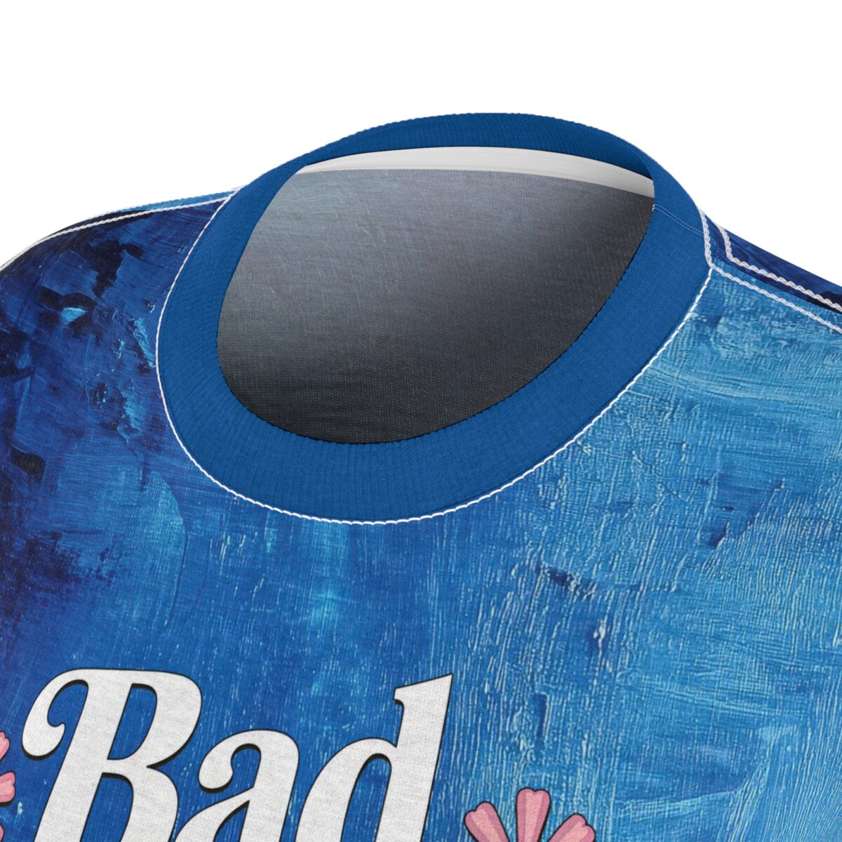 Distressed blue textured all over print sublimation tee, white text 'Bad', pink flowers.