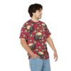 All over print sublimation tee featuring a vintage skull graphic with green and yellow polka dots on a maroon background.