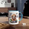 White ceramic mug with blue handle featuring a cute sloth holding a coffee cup and the text 'I DON'T DRINK COFFEE TO WAKE UP'.