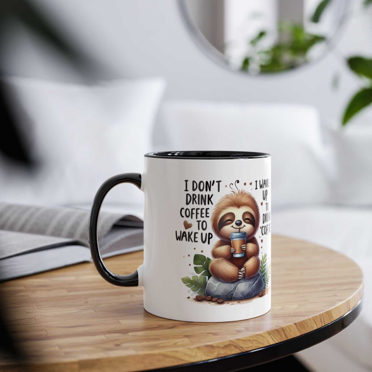 White ceramic mug with a black rim and handle, featuring a cute sloth graphic and text.
