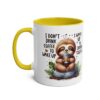 White mug with yellow handle and rim, featuring a cute sloth holding coffee and text.