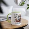 A white mug with a green rim and handle, featuring a cartoon sloth holding coffee.