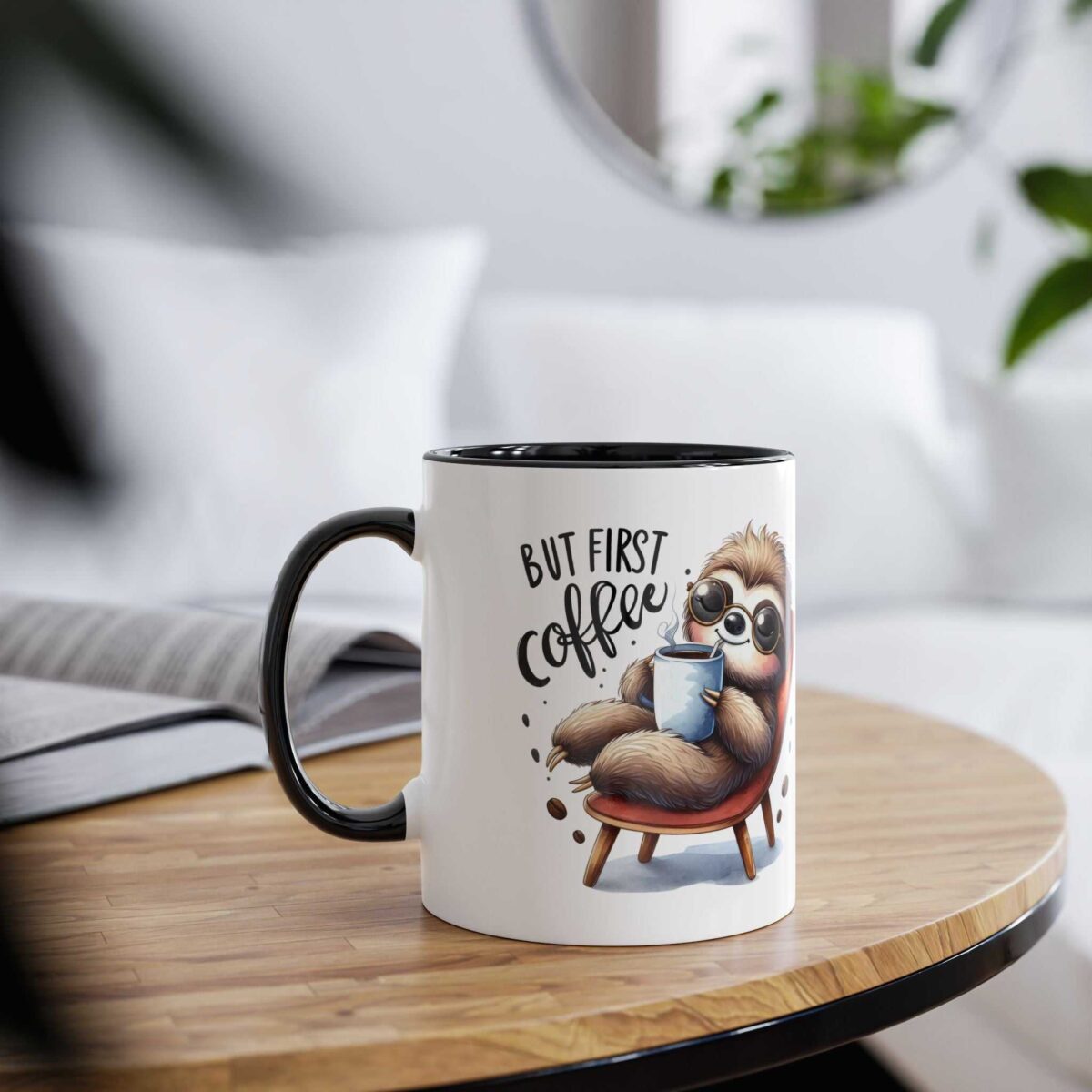 White ceramic mug with black rim and handle. Features a cute sloth wearing sunglasses, holding a coffee cup and a coffee bean graphic.