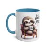 White ceramic mug with blue rim and handle, featuring a cute sloth holding a coffee cup.