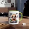 White ceramic mug with a cute sloth illustration, green handle, and text.