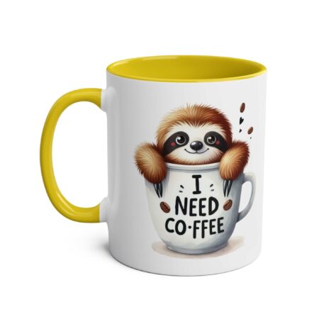 A white ceramic mug with a yellow interior and handle, featuring a cute sloth peeking out of a coffee cup with text.