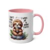 White ceramic mug with a pink handle and interior, featuring a cute sloth holding a coffee cup and text.