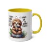 White ceramic mug with a yellow handle and interior, featuring a cute sloth holding a coffee cup.