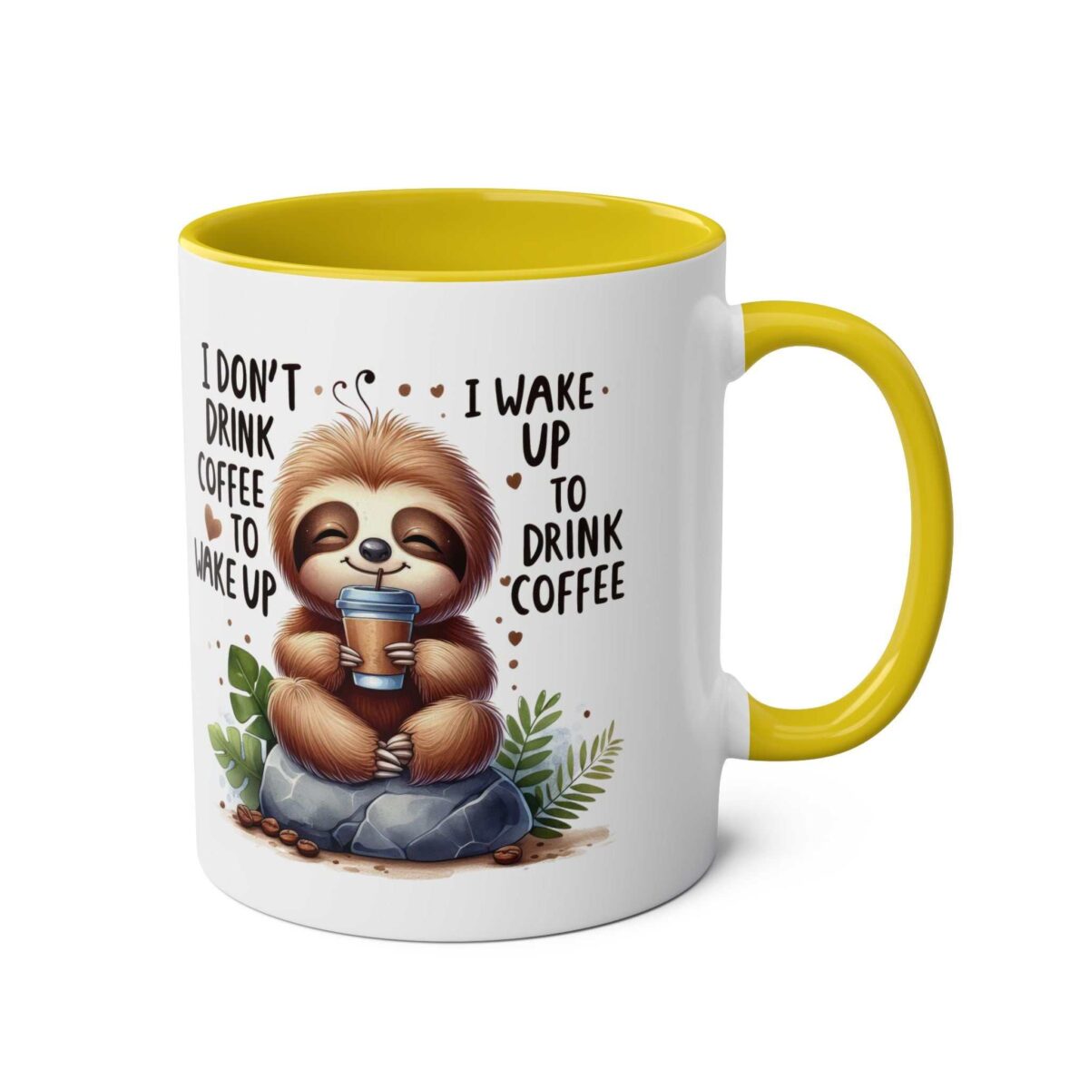 White ceramic mug with a yellow handle and interior, featuring a cute sloth holding a coffee cup.